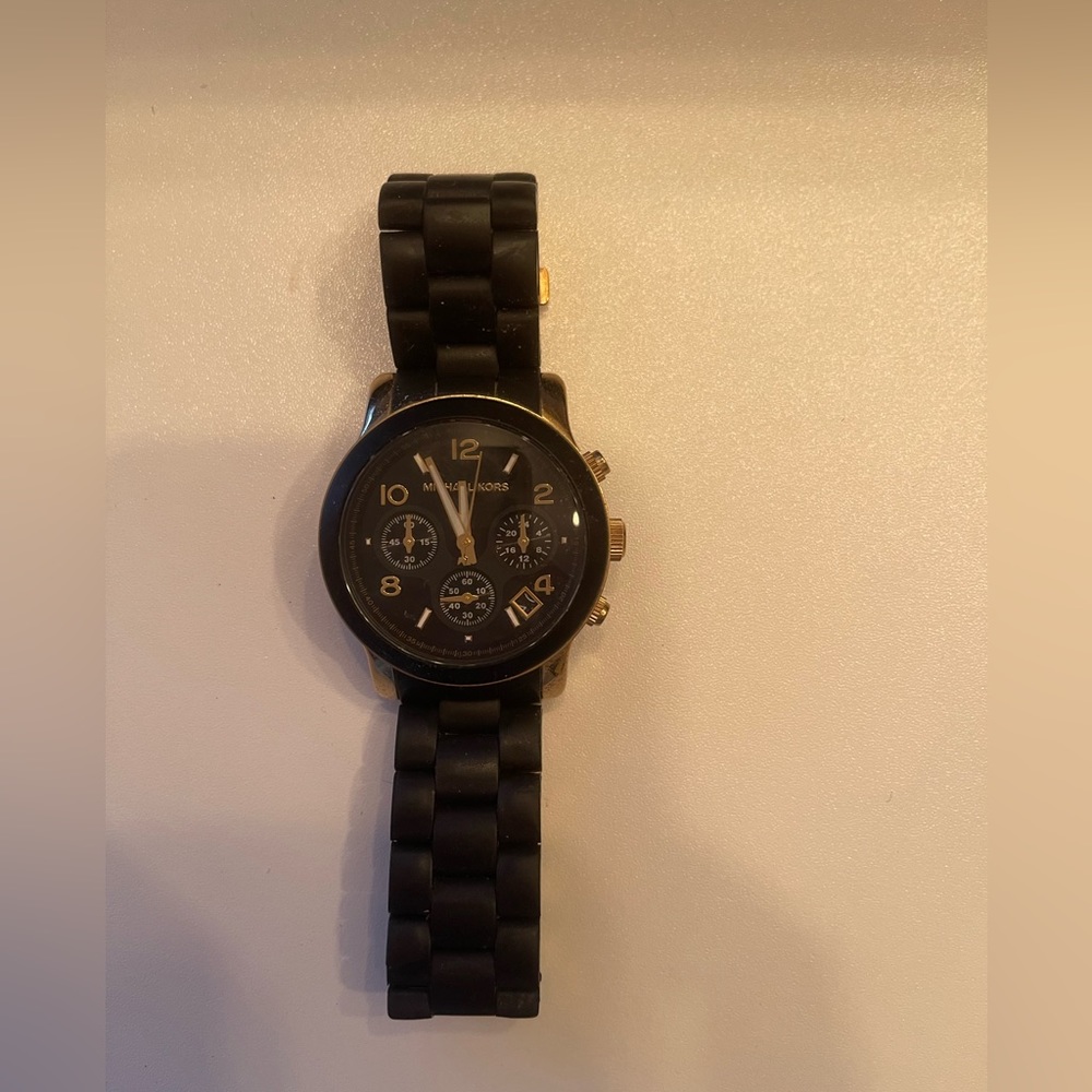 Black and gold Michael Kors watch